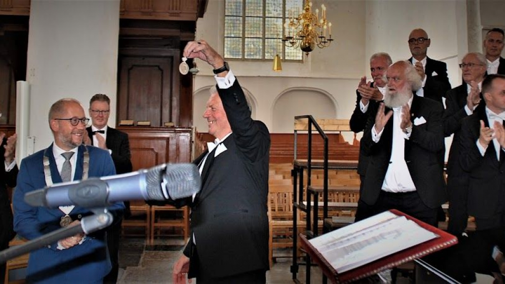 Foto: Uitreiking Erepenning aan jubilerend OBK