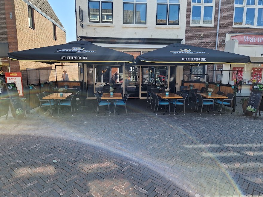 Foto: Column 'Rond een grote tafel'