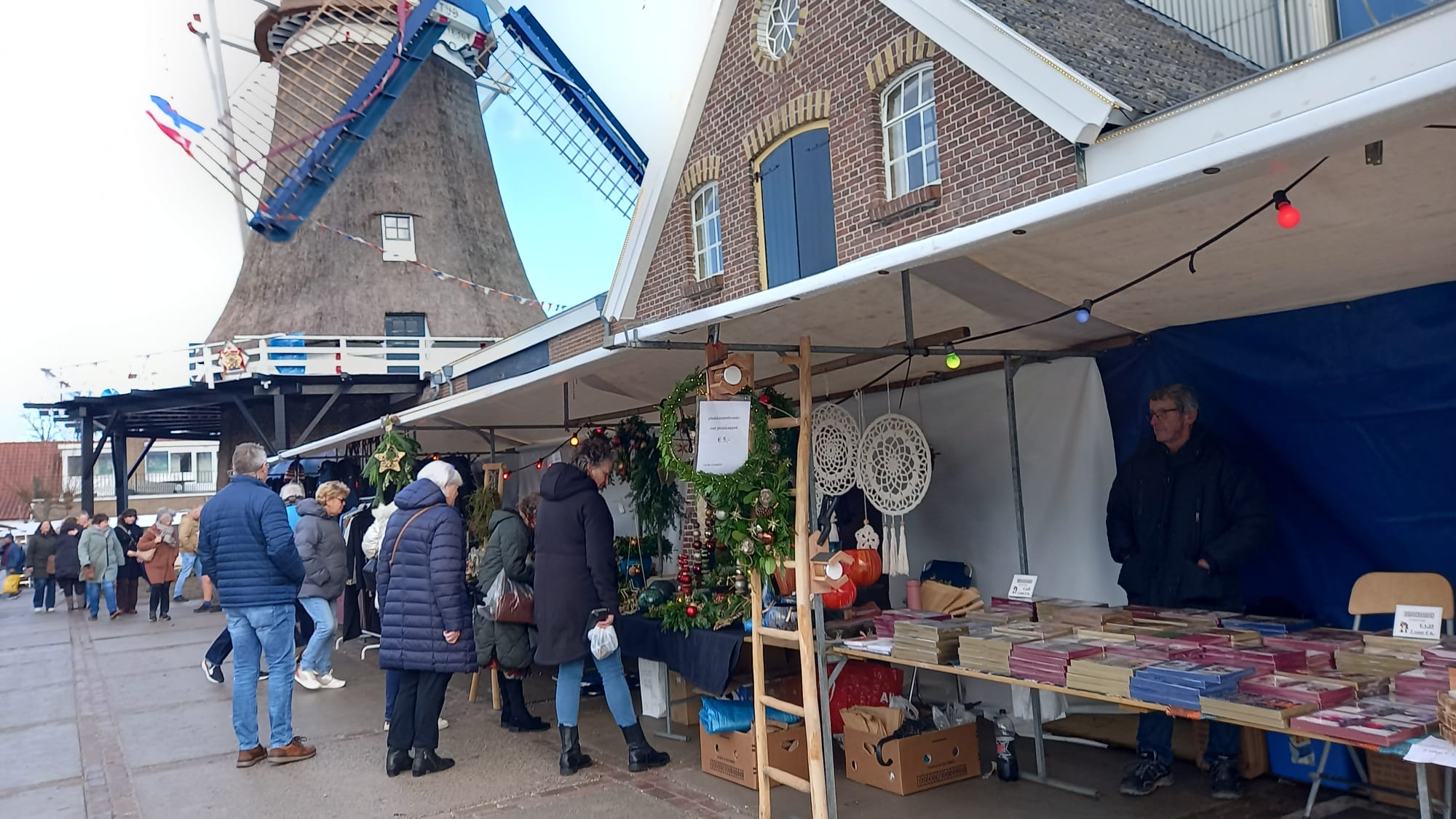 Foto: Gezellige KerstbijdeMolen  met de heropening van molen de Tijd