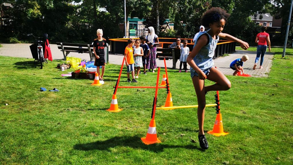 Foto: Kinderen genieten bij Natuurlijk Samen Spelen