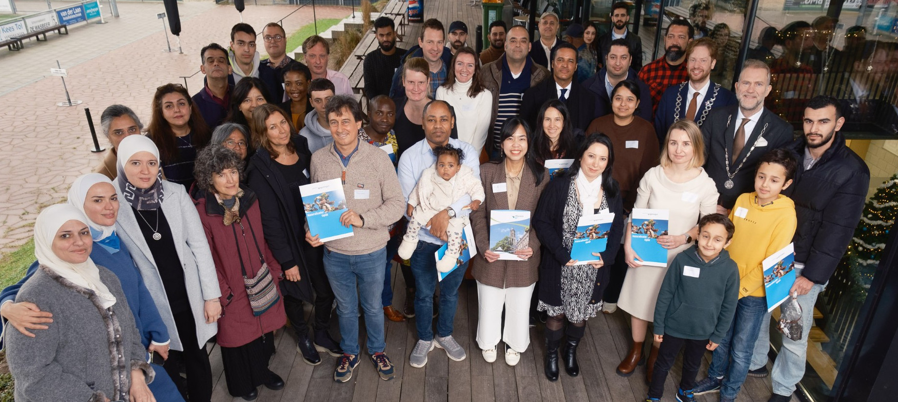 Foto: Warm welkom voor nieuwe Nederlanders